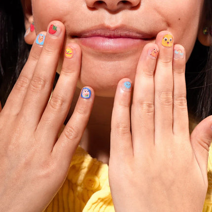 girl using nail stickers OMY - miniLama